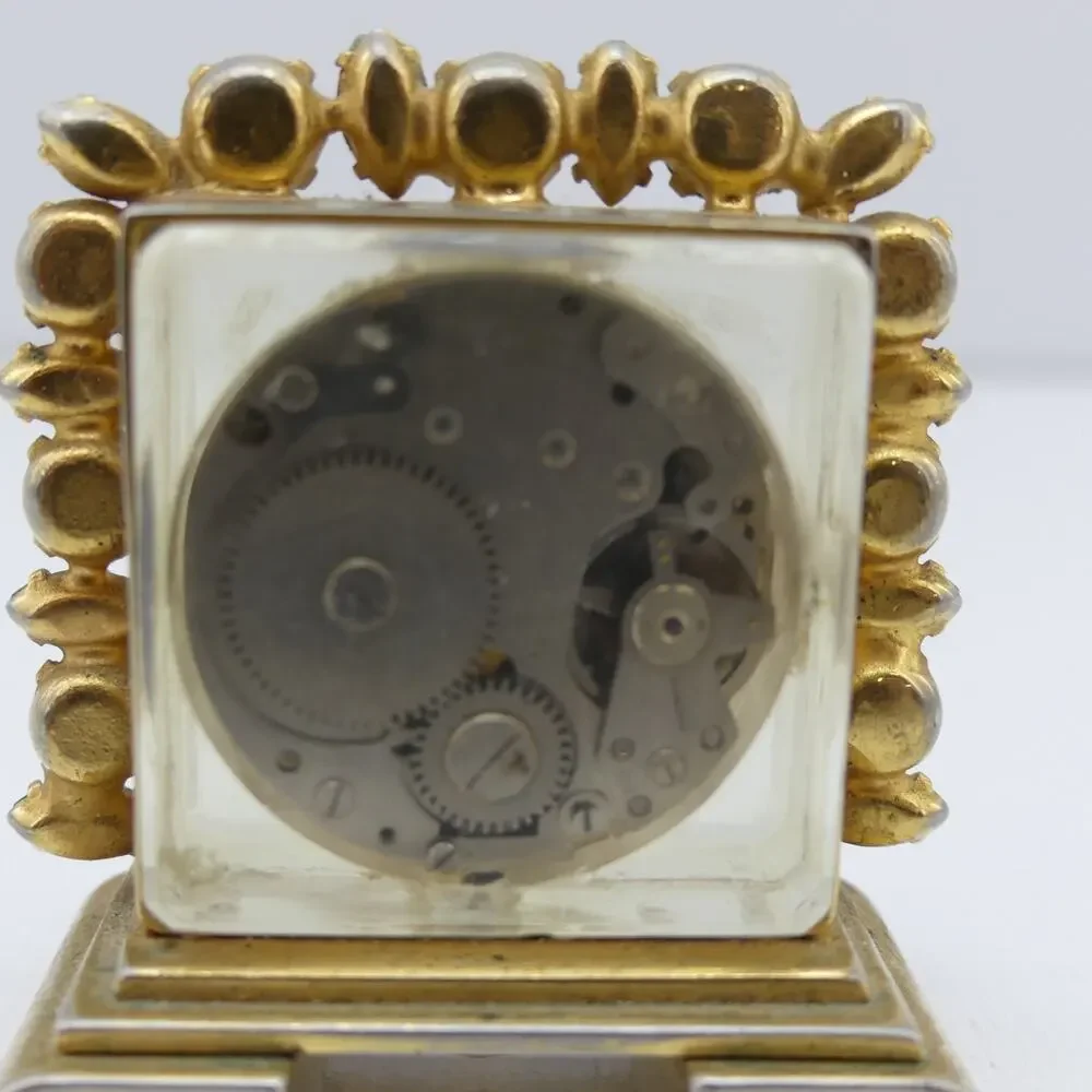 VTG Hilton Jeweled Antimagnetic Mini Skeleton Desk Clock Gold Tone Swiss Quartz